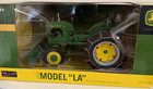 Speccast John Deere 1942 Model  la  Tractor With Chains And Snow Blade 1 16