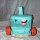 Fisher-price Pull Toy Milk Wagon With Driver And Colorful Wheels