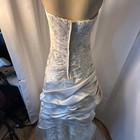 David s Bridal Strapless Satin Wedding Dress With Appliques And Tulle Underlay
