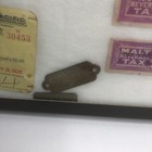 A Framed Collection Of Vtg Memorabilia Transportation Pins badges  Paper Tickets