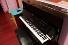 Upright Black Yamaha Piano With Bench