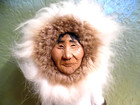 Hand Crafted hand Painted Inuit Alaskan Eskimo On Wood Base  Artist Signed Mary