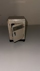 Vintage 1950s Louis Marx   Co   pretty Maid  Toy Refrigerator   light Rust 