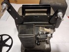 Vintage Bell   Howell 8mm Model 256 Projector  turns On   untested 
