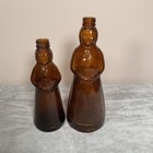 2 Vintage Mrs Butterworth s Amber Glass Syrup Bottles - 8  And 10  - No Caps