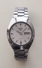 Vintage Seiko 5 Automatic 7009-8760 Silver Pinstripe Dial 17j Cushion Case Watch