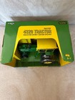 Ertl 1 16  John Deere 4320 With Hiniker Cab