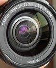 Canon Ef 28mm F 2 8 Is Usm  canon Ef Mount  Has Some Writing 
