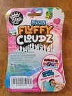 Neon Fluffy Cloudz   Fruity Floral Scented   Surprise Charm Inside  puffy Slime