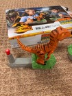 Jurassic World Rock em Sock em Blue Vs Atrociraptor Game W box Used But Complete