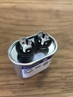  1  27l571s Genteq Capacitor 4uf 370v Application Motor Run 370 Volt 27l571