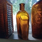 1880s Pretty Amber 1 2 Pint Pocket Whiskey Flask Hand Blown Nice