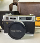 Vintage Yashica Electro 35 Gsn 35mm Rangefinder Camera W  Case Accessories Works