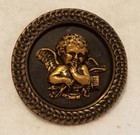 Antique Tinted Brass Button With A Smiling Cupid  Link Border Design  1-11 16 