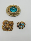 Signed Vintage Trio Of Brooches In Teal blue And Gold Tone