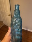 Antique Mother Mary Hand Blown Glass Bottle With Ornate Handle  blue 