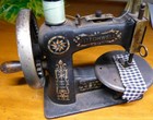 Antique Child   s Miniature Cast Iron Stitchwell Sewing Machine