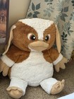 A Large Gizmo Plush Toy From The Gremlins Franchise