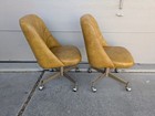 Vintage Pair Of Mid Century Modern Atomic Mustard Yellow Vinyl Rolling Chairs
