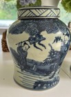 Two Chinese Vases With Images Of Two Men