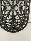 Vintage Cast Iron Oval Trivet Footed Hot Plate Ornate Floral Scrollwork 10 Inch