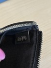 Coach Corner Zip Wristlet In Signature Canvas F58035