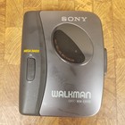 Sony Walkman Wm-ex122 Portable Cassette Player With Belt Clip   New Headphones