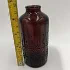 Wheaton Glass Bottle   Amethyst Color ornate Design
