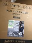 Delta Children Oval City Sleeper Bassinet 25506-2225  Xb21010 Beige