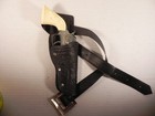 Two Cap Pistols And Three Black Holsters With Belt Buckels