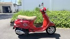 Red Vespa Lx 150 Scooter 2012