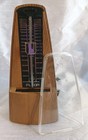 Fleor Metronome Model- Grain Wood Look Plastic Excellent Condition 