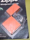 Vintage 2000 Orange Zippo Lighter - New In The Package