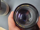 Assortment Of Vintage Camera Lenses And Converters  