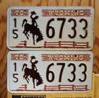 One Or More - 1978 Wyoming Cowboy Horse Fence Brown License Plate Set   Pair