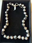Hawaiian Hibiscus Kukui Nut Lei Necklace Black   White