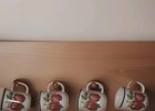 Wooden Shelf With Apple Patterns And Coffee Mugs