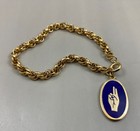Girl Scout Brownie Golden Hand Bracelet  Oval Charm With Blue Background