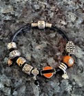 Pandora Braided Leather Bracelet With 8 Genuine Harley Davidson Charms