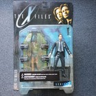X-files Bundle  Agent Fox Mulder 1998 Figure In Box   1998 X-files The Movie Vhs