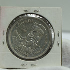 1958 Canada Silver  800 Totem Pole Silver Dollar Xf
