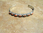 Joyful     Vintage Navajo Sterling Silver Seven Coral Row Bracelet