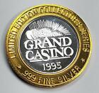  999  10 Silver Strike   Gaming Token   1995 Grand Casino   Laurel   Hardy