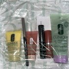 Clinique 7 Pcs Gift Set Moisturizing Lotion  Mascara Lip Color   Primer W bag
