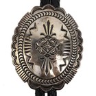 Thomas Curtis  1942-2013  Navajo Stamped Sterling Silver And Leather Bolo Tie 