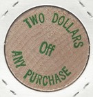 Oscars  Biloxi  Mississippi  Two Dollars Off Any Purchase  Token  Wooden Nickel
