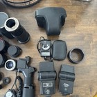 35mm Camera Accessories Lot  no Camera  Lens  Flashes  Carrier And More See Pics