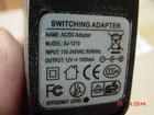 Switching Ac dc Adapter Model  Sj-1210   100-240 Volt Input 12 Volt Output 