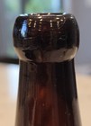 A  Haas Brewing Co   Embossed Amber 1 Quart Houghton Mich Beer Blob Top Bottle
