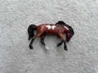 Retired Breyer Horse Stablemate  6039 Mystery Surprise Bay Pinto Rivet Mustang
